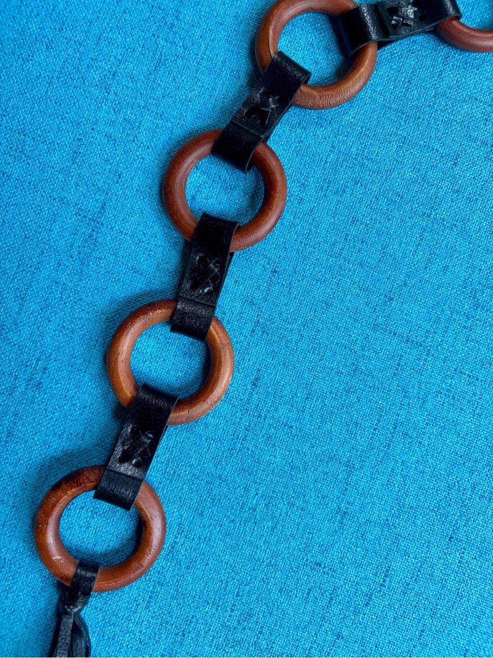 Brown leather fringe belt with wooden circular links and tassels #boho #western